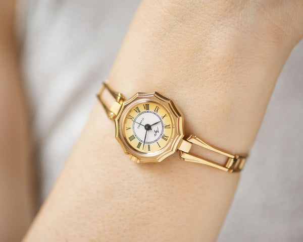 Ladies wristwatch bracelet Roman numerals yellow dial, vintage cocktail watch Ray, gold plated watch 90s woman jewelry gift party accessory