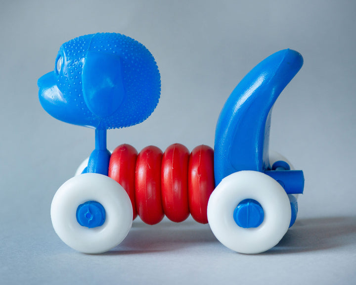 Vintage plastic dog puppy toy assembled kid's toy, blue red white white on wheels doggy moving neck toy eye rolling dog nursery room decor