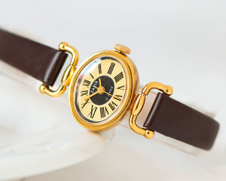 New old stock women's watch oval gold plated Dawn, ladies wristwatch Roman numerals, cocktail watch women yellow, new genuine leather strap