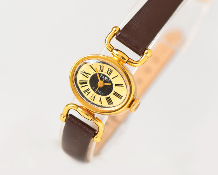 New old stock women's watch oval gold plated Dawn, ladies wristwatch Roman numerals, cocktail watch women yellow, new genuine leather strap