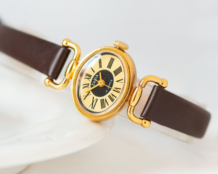 New old stock women's watch oval gold plated Dawn, ladies wristwatch Roman numerals, cocktail watch women yellow, new genuine leather strap