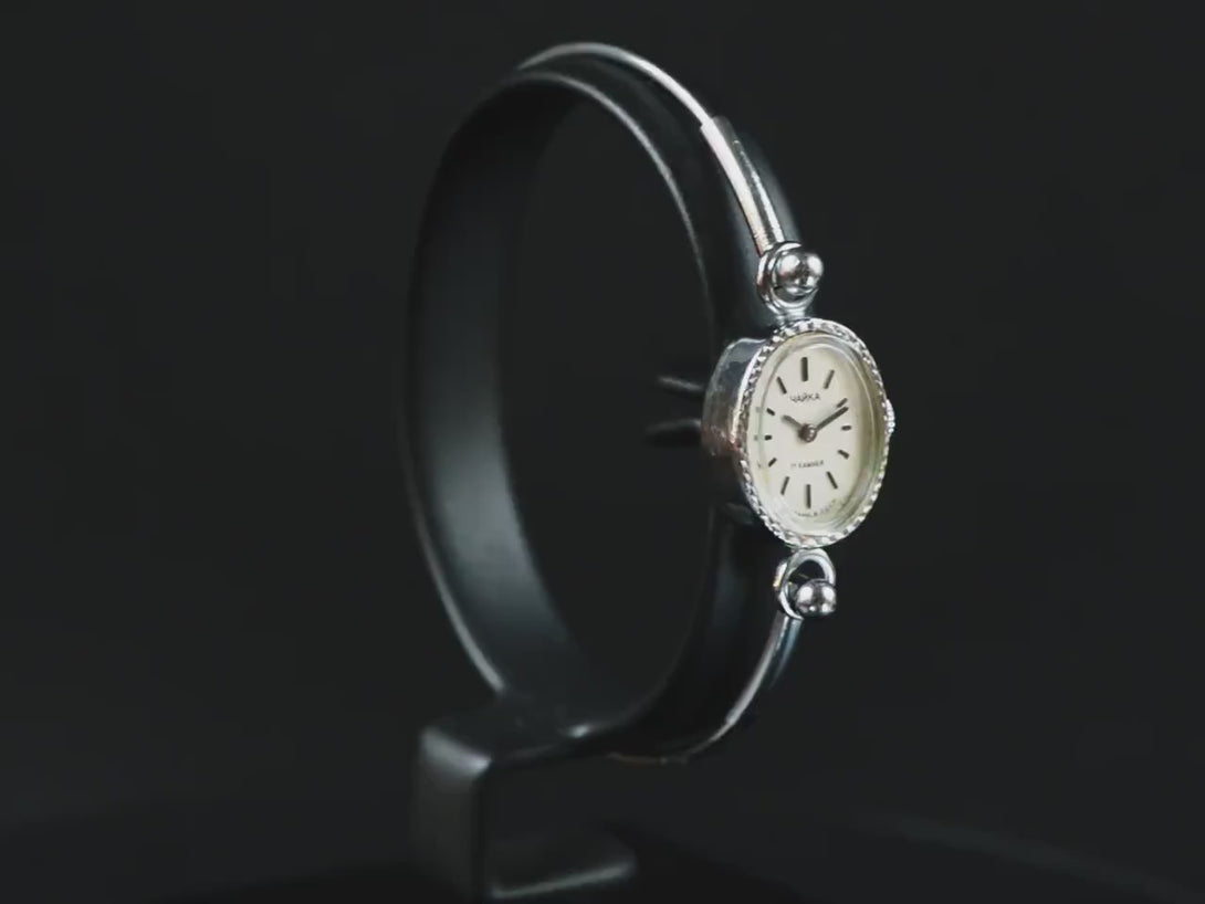Minimalist cocktail watch bracelet for women, Seagull silver shade oval dial, lady tiny bangle, small watch, unique, vintage gift jewelry